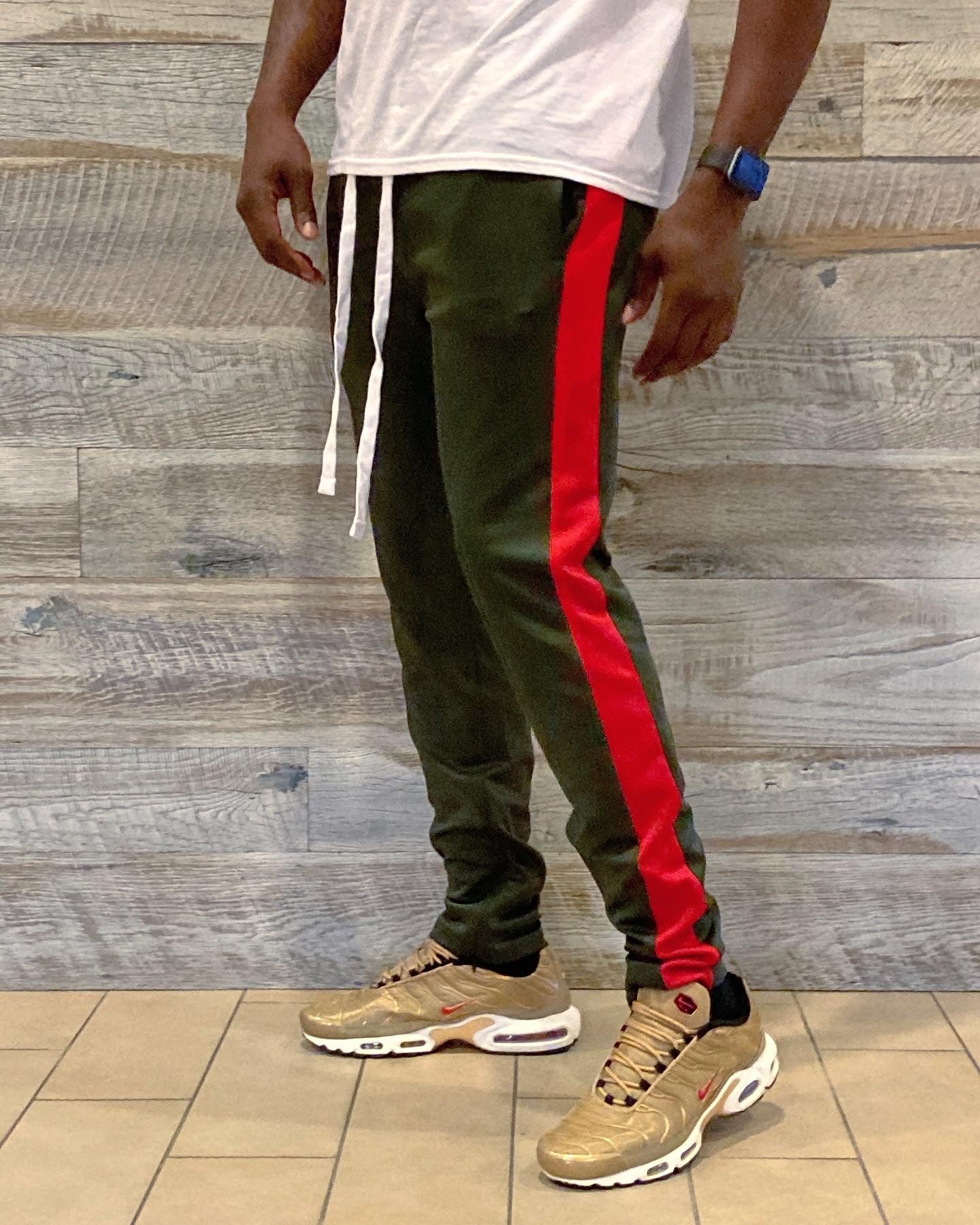 Green and best sale red track pants